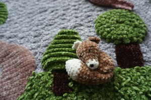 crochet fox on crochet blanket